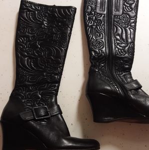 Black leather Taryn Rose boots embossed roses